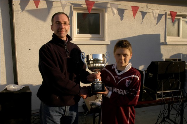 Kevin Carolan Presents Carolan Cup to Liam Cawley